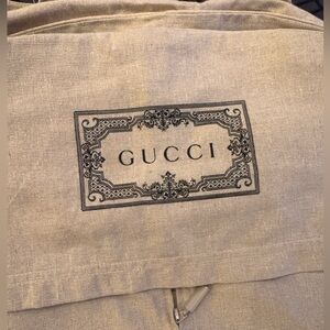Gucci travel garment bag with snaps and handles